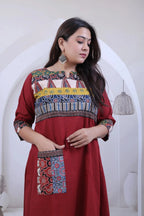 Saanvi Maroon Ajarakh Neck & Pocket A line Kurti