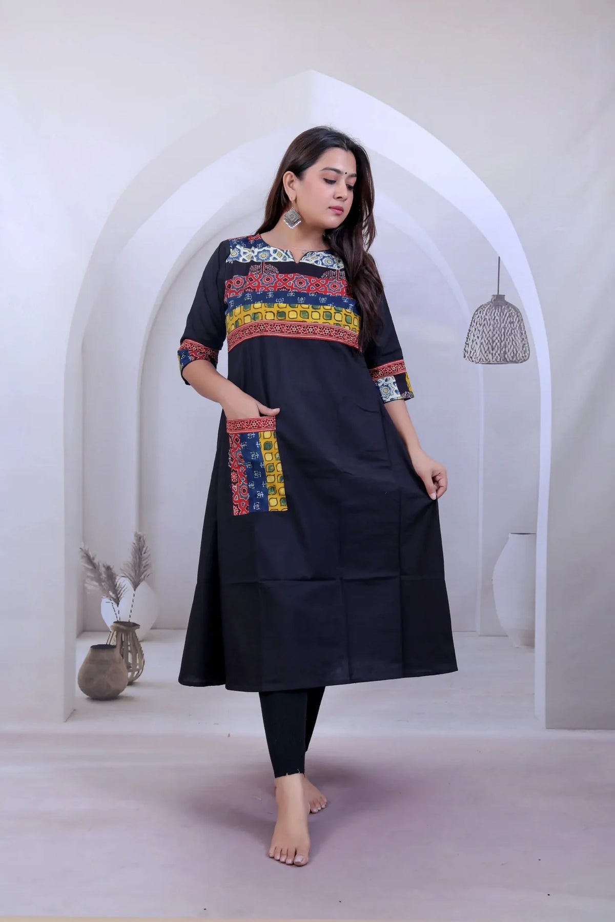 Saanvi Black Ajarakh Neck & Pocket A line Kurti