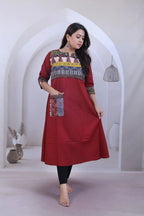 Saanvi Maroon Ajarakh Neck & Pocket A line Kurti
